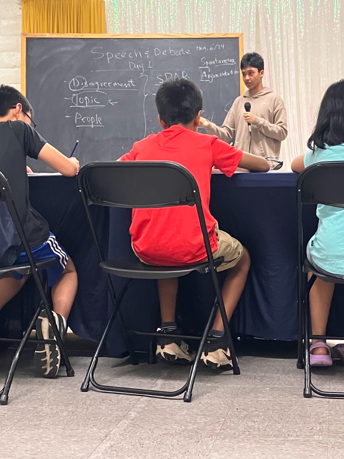 Students participating in debate